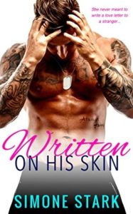 Tattooed, abtastic shirtless hot guy wearing dog tags with his hands in his hair