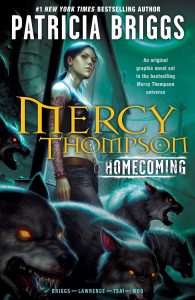 Cover of graphic novel Mercy Thompson Homecoming, featuring Native American woman surrounded by werewolves against a green night background