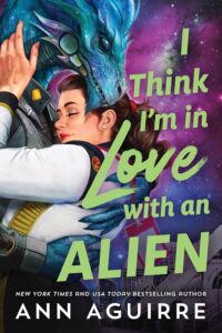 Illustrated cover in the style of a 1950s sci-fi movie featuring a purple and blue night sky background on the right and on the left and centre, a pretty white woman in the embrace of a blue alien with a kind of dragon face in blue with a touch of purple.